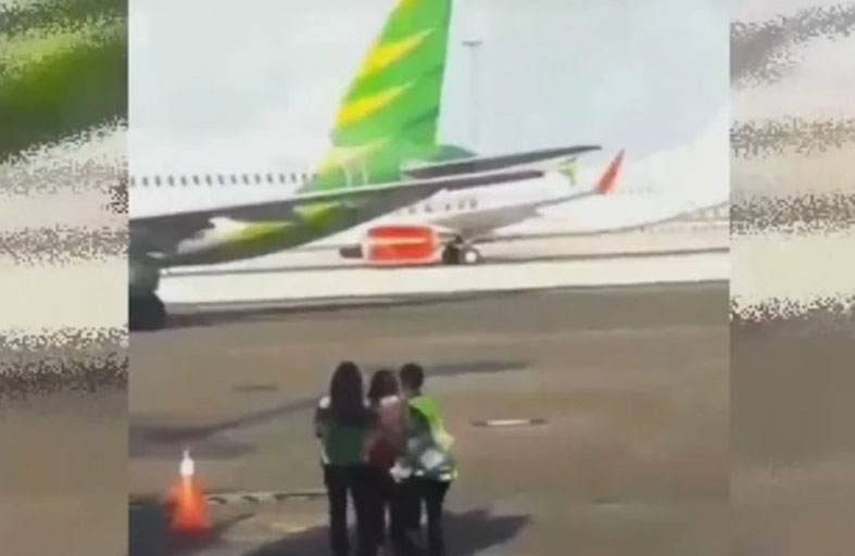 اعتقال امرأة حاولت مطاردة طائرة 