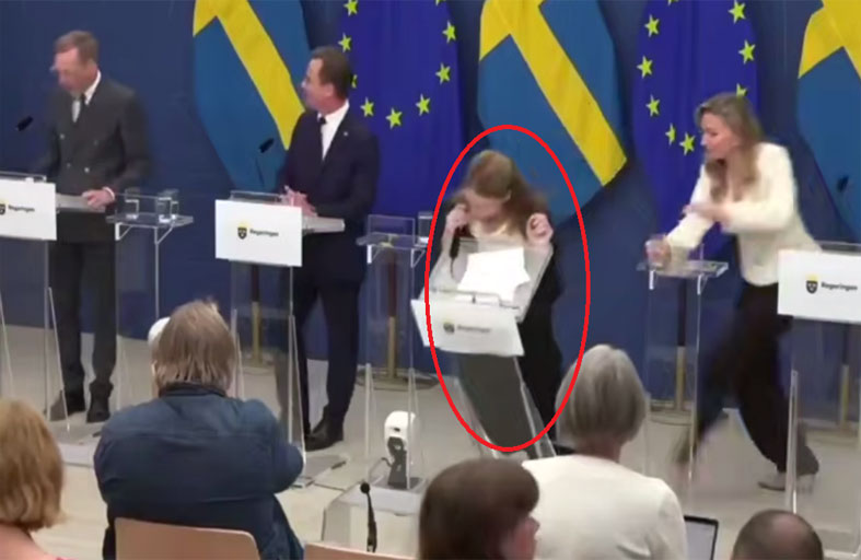 انهيار وسقوط وزيرة الصحة السويدية خلال مؤتمر صحفي 