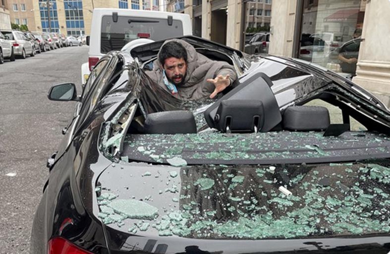 رجل يقوم بعد سقوطه من الطابق التاسع