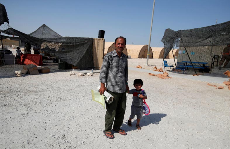 لاجئون أفغان يقيمون في مقر كأس العالم في قطر 