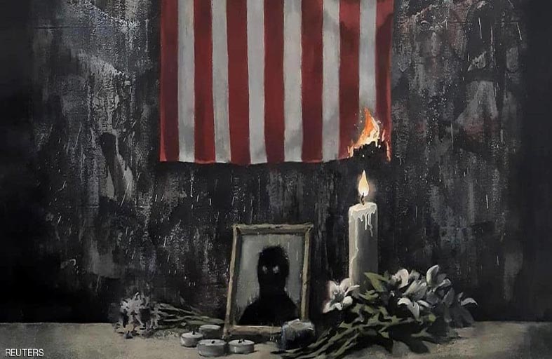 نعي لفلويد.. بلوحة تصور العلم الأميركي يحترق