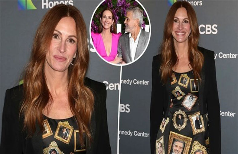 جوليا روبرتس تزين ثوبها بصور جورج كلوني 