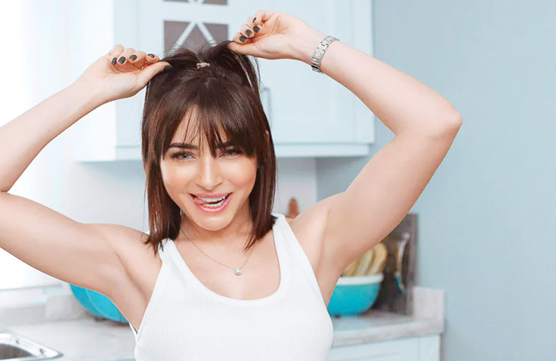 ساندي: سعدت بتجربة تصميم بوستر «في عز الضهر» 