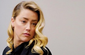 آمبر هيرد تضع حدا لصراعها مع جوني ديب