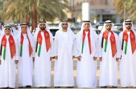 سعود بن صقر  يشهد رفع علم الدولة على سارية العلم  في رأس الخيمة