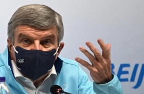  توماس باخ: الشعلة الأولمبية رمز يحتاج له العالم