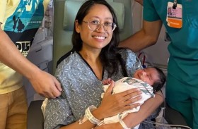 جنين خارج الرحم مختبئ وراء ورم يزن 10 كغم