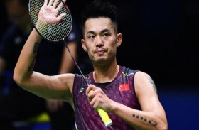 بطل الريشة الصيني لين دان يعلن اعتزاله 