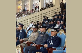 وفد من شرطة أبوظبي يزور كلية الشرطة في قطر