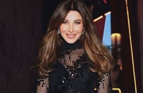 نانسي عجرم تثير الجدل في عزاء زوج كارول سماحة