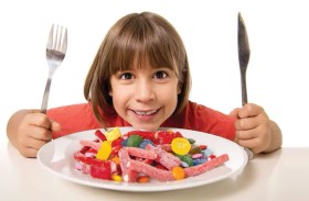 ما كمية الحلوى التي يمكن للأطفال تناولها في اليوم؟