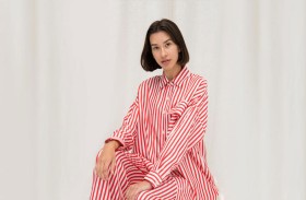 «القميص المقلم» نجم الموضة النسائية