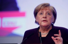 ميركل: العنصرية وكراهية الأجانب «سم»