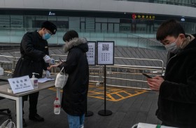 الصين تشدد إجراءات فحص القادمين 