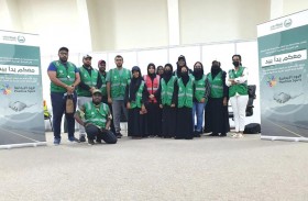 متطوعو شرطة دبي يشاركون في المبادرة الوطنية المجتمعية «معكم يداً بيد»