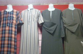 جلابيات كرداسة تلفت اهتمام ضيفات القرية العالمية