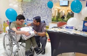 شرطة أبوظبي تشارك  بمبادرة يوم سعادة المرضى والعودة للمدارس في «توام»