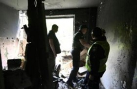 مدّعون عامون من خاركيف يزورون مبنى مدمّرا من القصف الروسي 