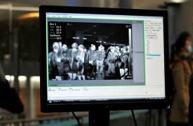 مطار يفحص المسافرين بكاميرات حرارية