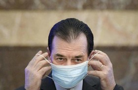 تغريم رئيس وزراء بسبب الكمامة 