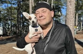 كلب ينقذ صاحبه من نوبة قلبية