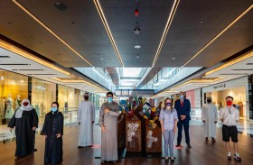 أزهار الأمل .. مجسم فني يشارك في إنجازه لأول مرة أصحاب الهمم