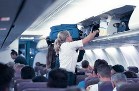 ذعر في السماء.. مصاب بكورونا في الطائرة