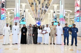 وضع شعار القرية العالمية الخاص بالموسم الـ 30 على التأشيرات الصادرة من إقامة دبي