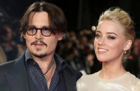 آمبر هيرد تدفع مليون دولار لجوني ديب 