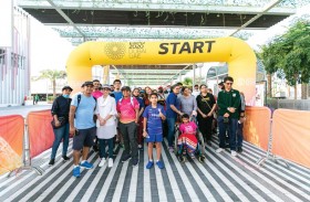 الآلاف يحتشدون خلال مسيرة من أجل الإنسان وكوكب الأرض في إكسبو 2020 دبي